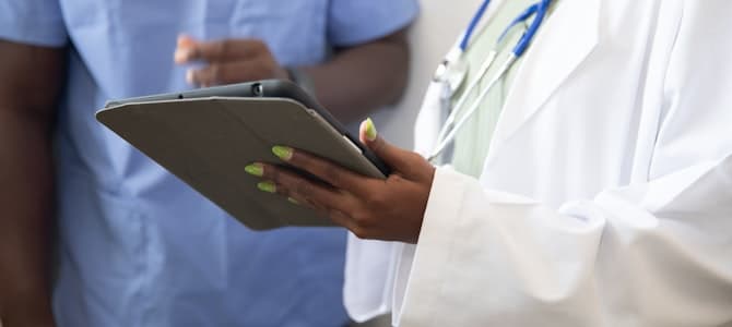 Healthcare professional with patient