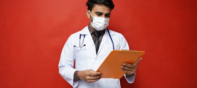 Healthcare professional reviewing documents